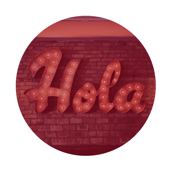 a marquee sign with the text "hola"